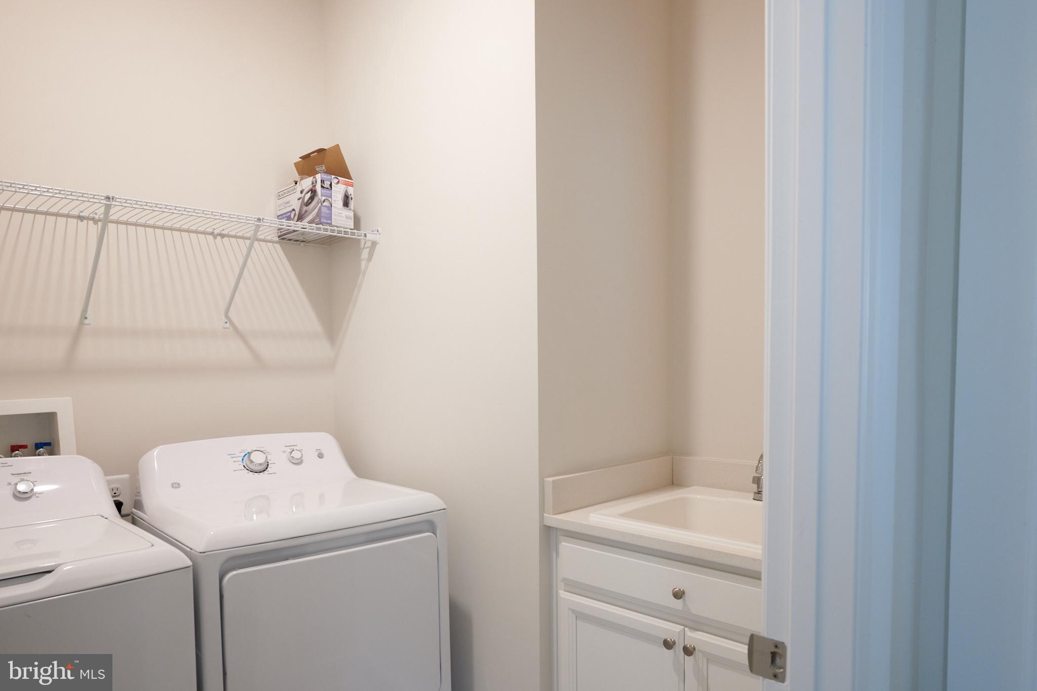 33173 Ponte Vecchio Plaza Ocean View, DE 19970 - Photo 19 of 19 a view of bathroom with a washer and dryer