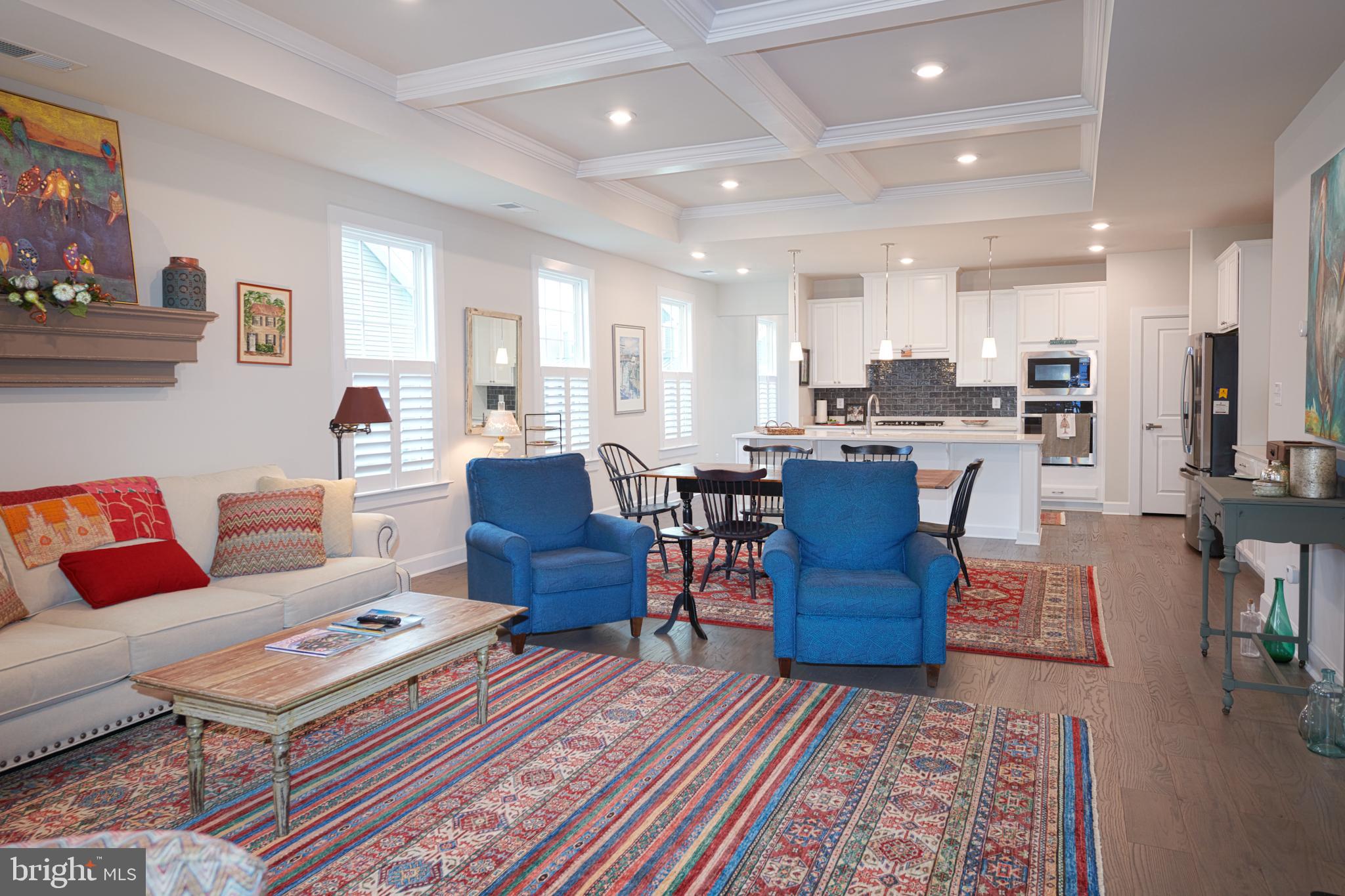 33173 Ponte Vecchio Plaza Ocean View, DE 19970 - Photo 3 of 19 a living room with lots of furniture and a rug