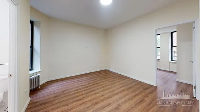 a bathroom with a sink a mirror and a shower