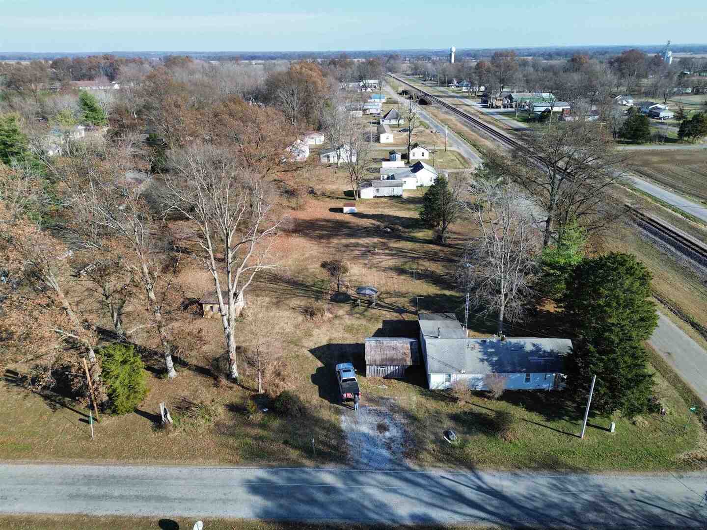104 Malone Street Sims, IL 62886 - Photo 2 of 13 an aerial view of a house with a yard basket ball court and outdoor seating