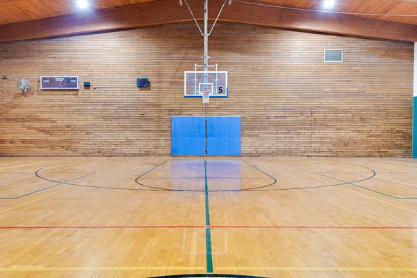 a view of play room with a projector and screen