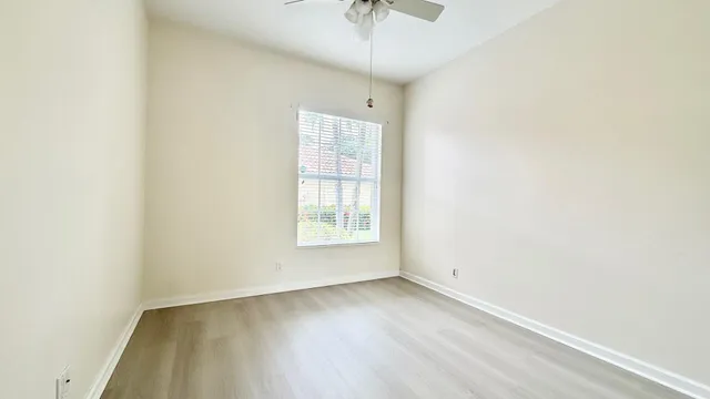 a utility room with a sink washer and dryer