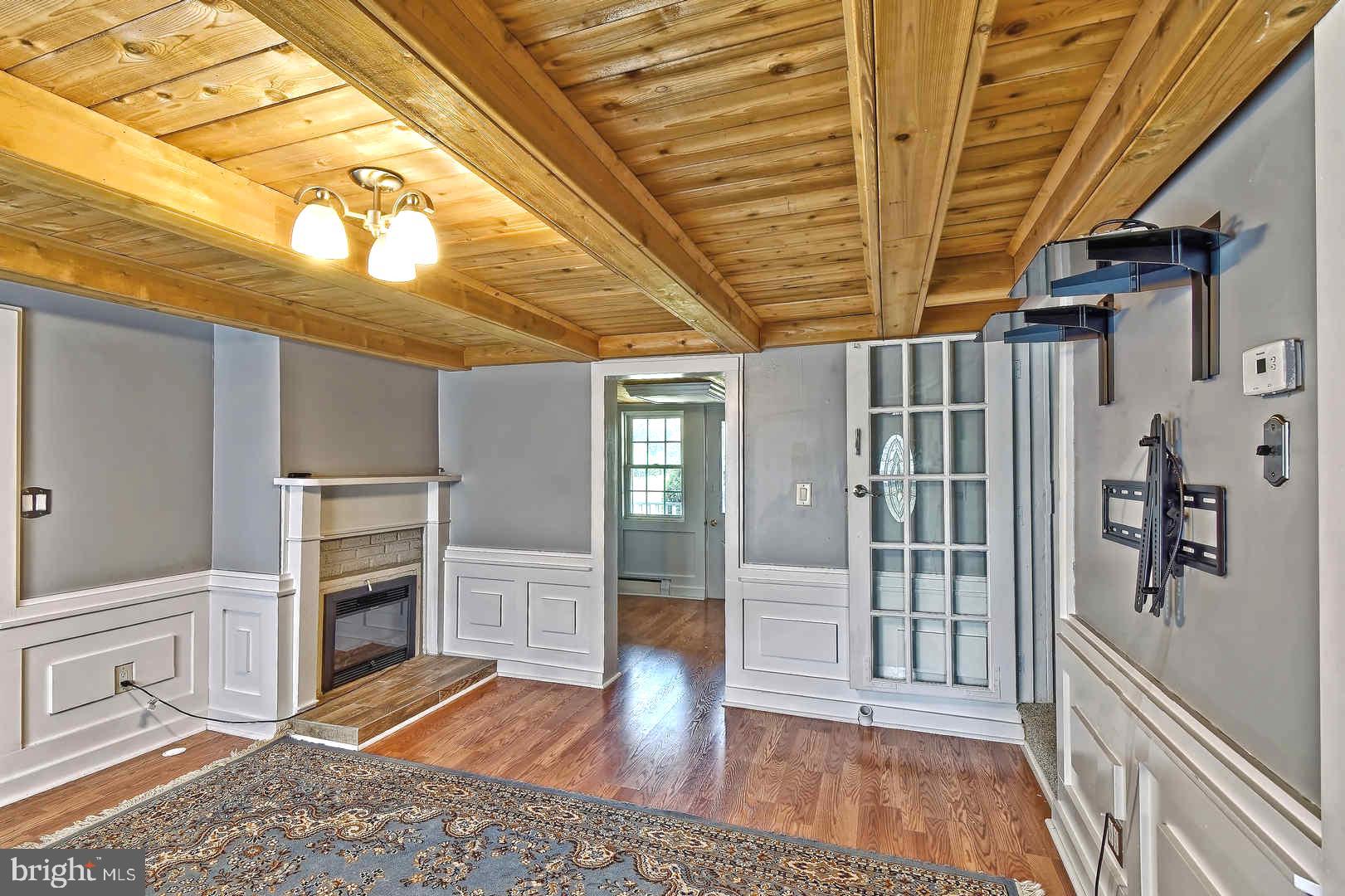 13 Hell Neck Road Salem, NJ 08079 - Photo 12 of 37 Family Room with Electric Fireplace Insert