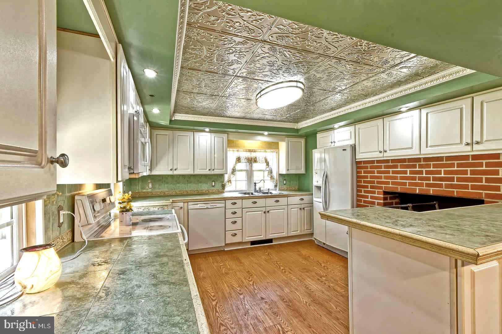 13 Hell Neck Road Salem, NJ 08079 - Photo 18 of 37 Kitchen w/Tin Tray Ceiling and Wood Floor