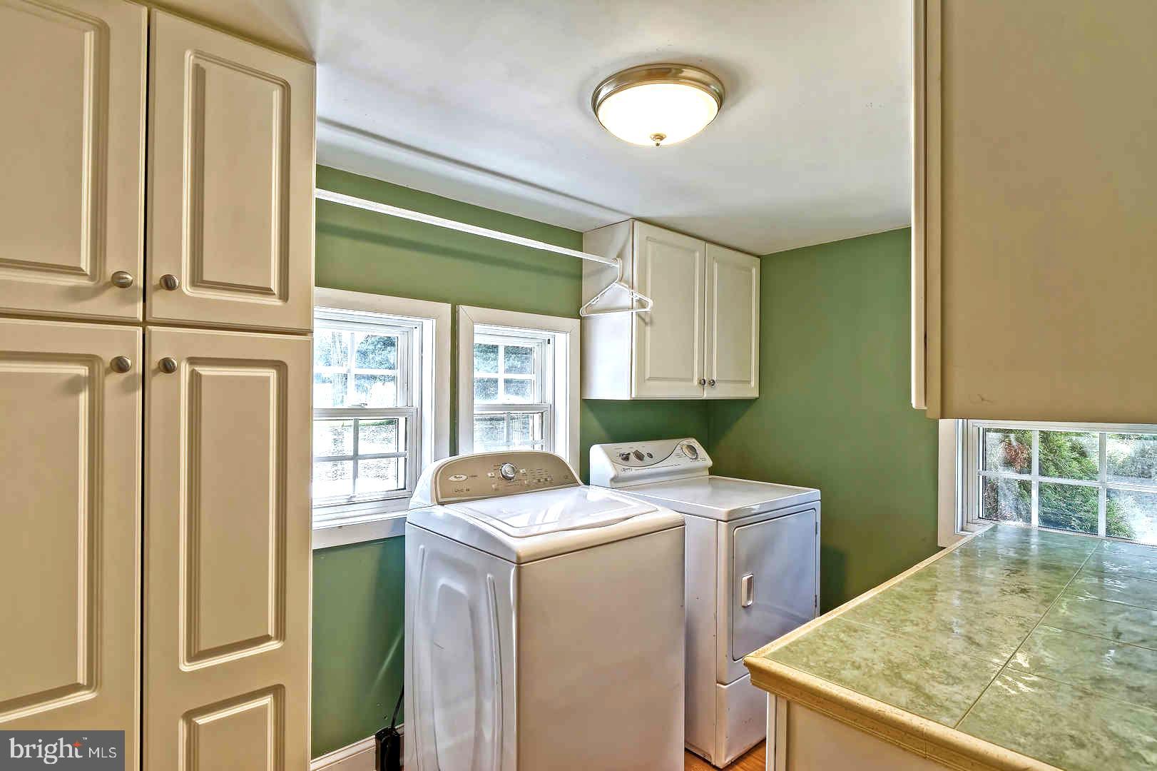 13 Hell Neck Road Salem, NJ 08079 - Photo 26 of 37 1st Floor Laundry w/ Pantry, Closet and Counter