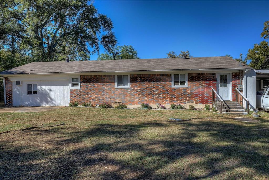 208 Miller Street Mount Vernon, TX 75457 - Photo 1 of 1 a front view of a house with garden