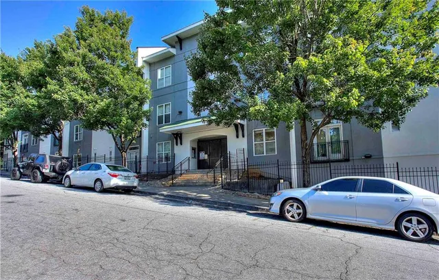 a car parked in front of a house