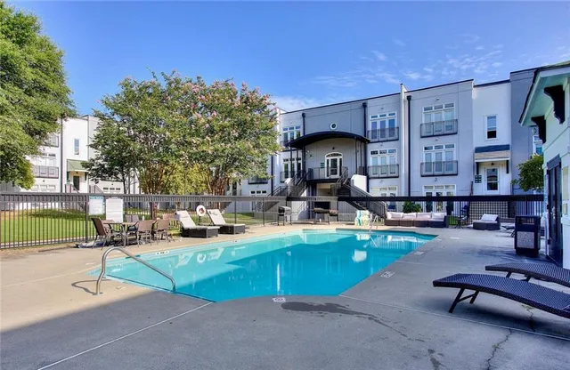 a view of a chairs and table in the patio