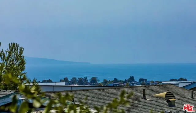 a view of ocean view and city view