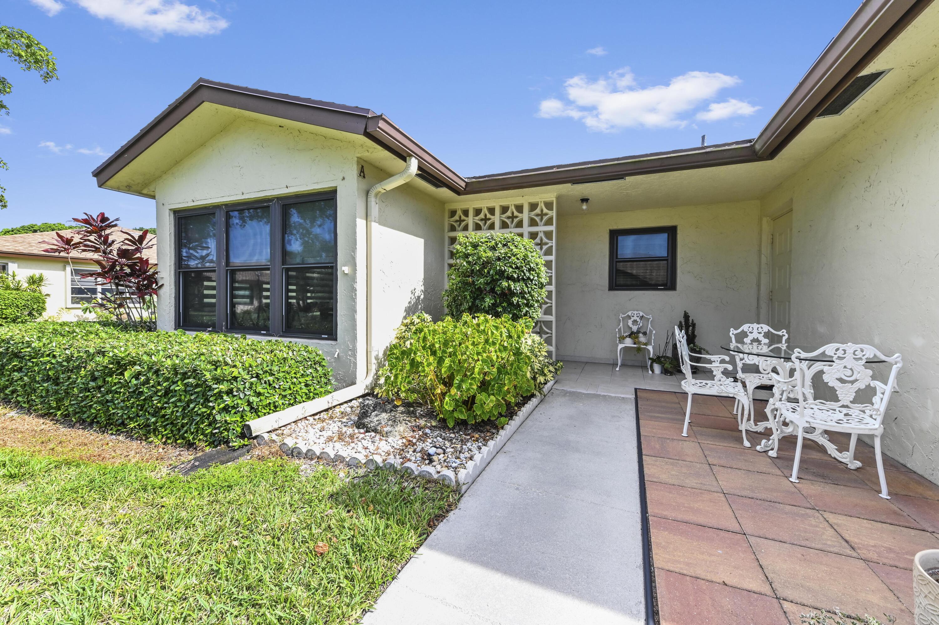 14080 Nesting Way, Unit A Delray Beach, FL 33484 - Photo 2 of 30 03 Front 03