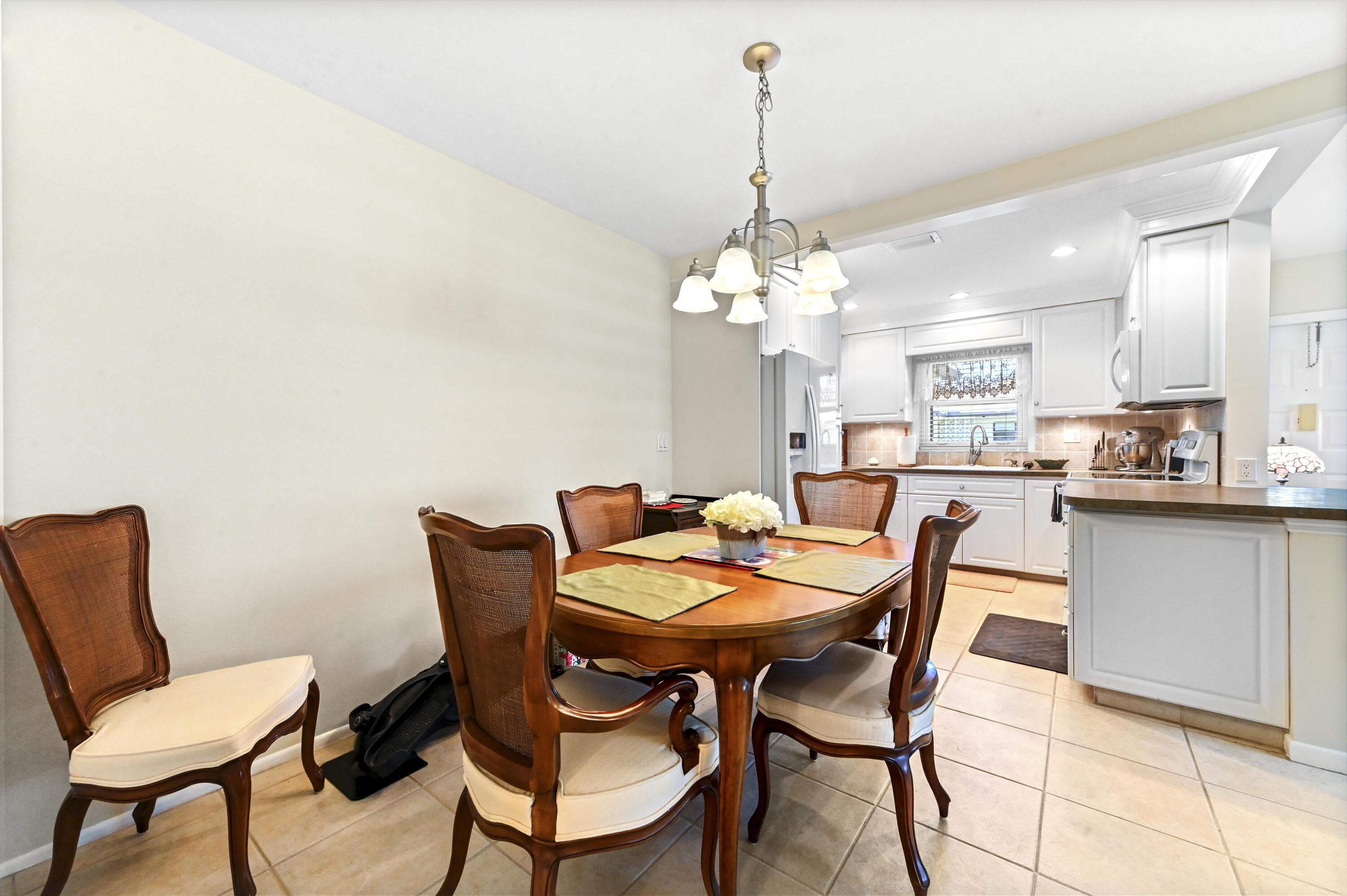 14080 Nesting Way, Unit A Delray Beach, FL 33484 - Photo 6 of 30 09 Dining room 01