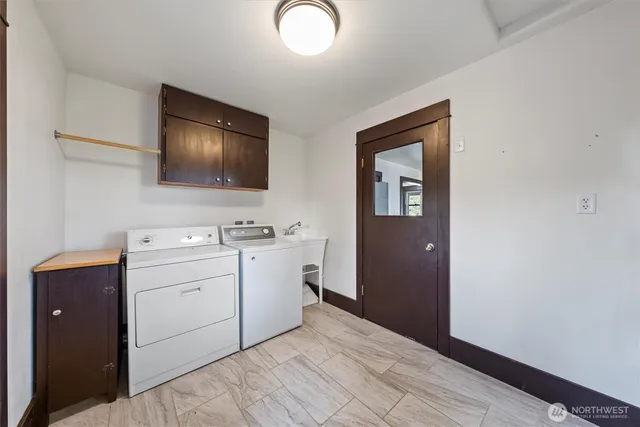 a workspace with a large mirror