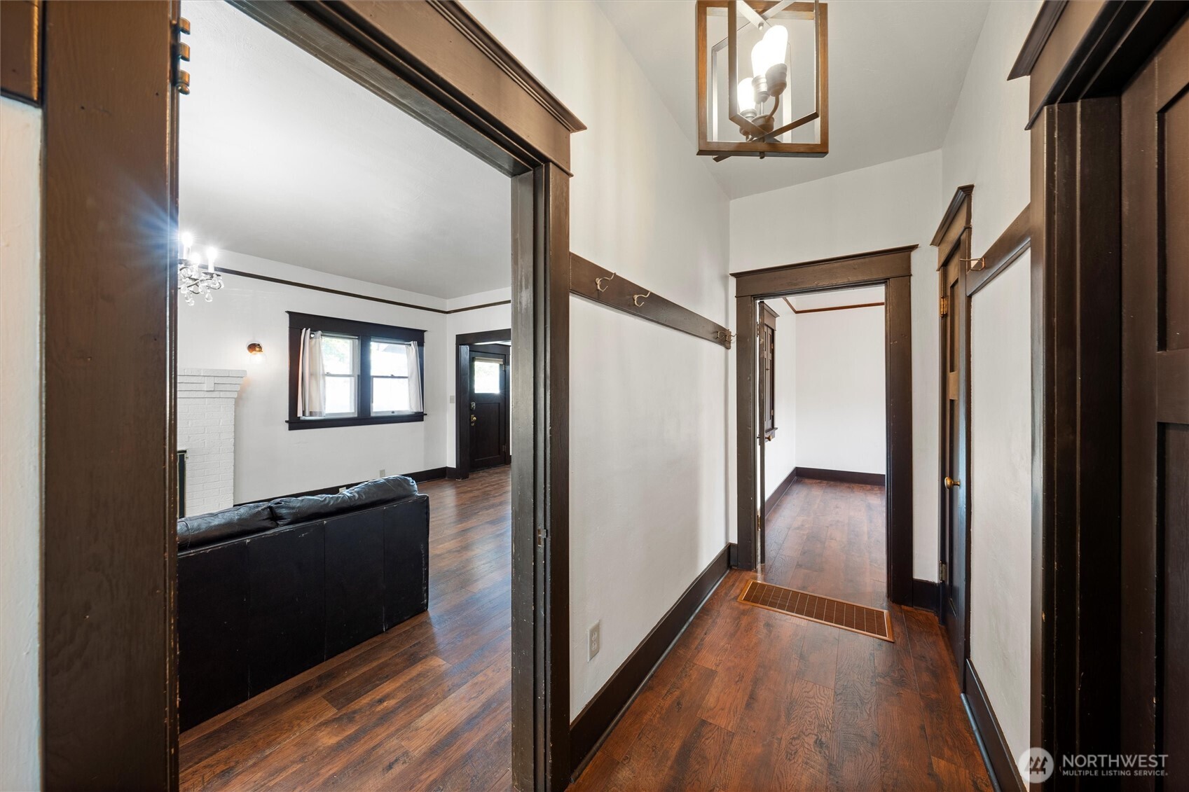 505 D Street Southwest Ephrata, WA 98823 - Photo 17 of 28 a view of a hallway with wooden floor windows and a living room
