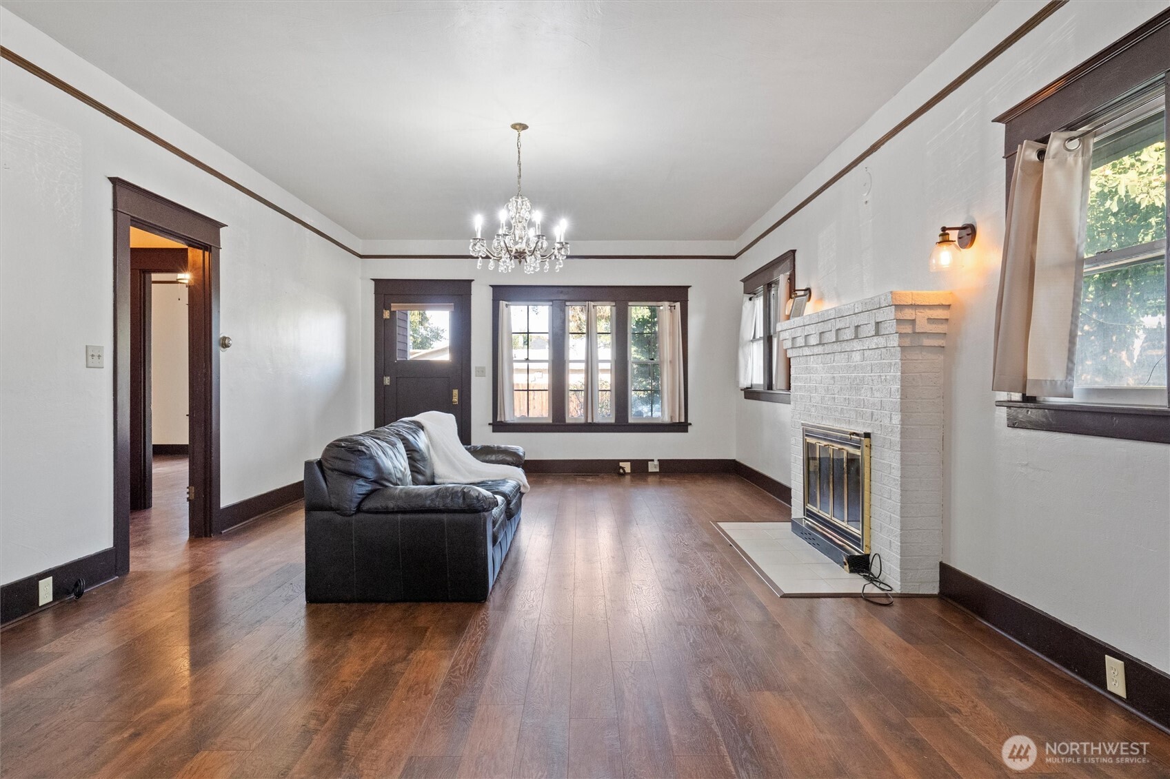 505 D Street Southwest Ephrata, WA 98823 - Photo 7 of 28 a living room with fireplace furniture and a wooden floor