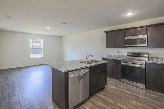 a view of workspace with wooden floor