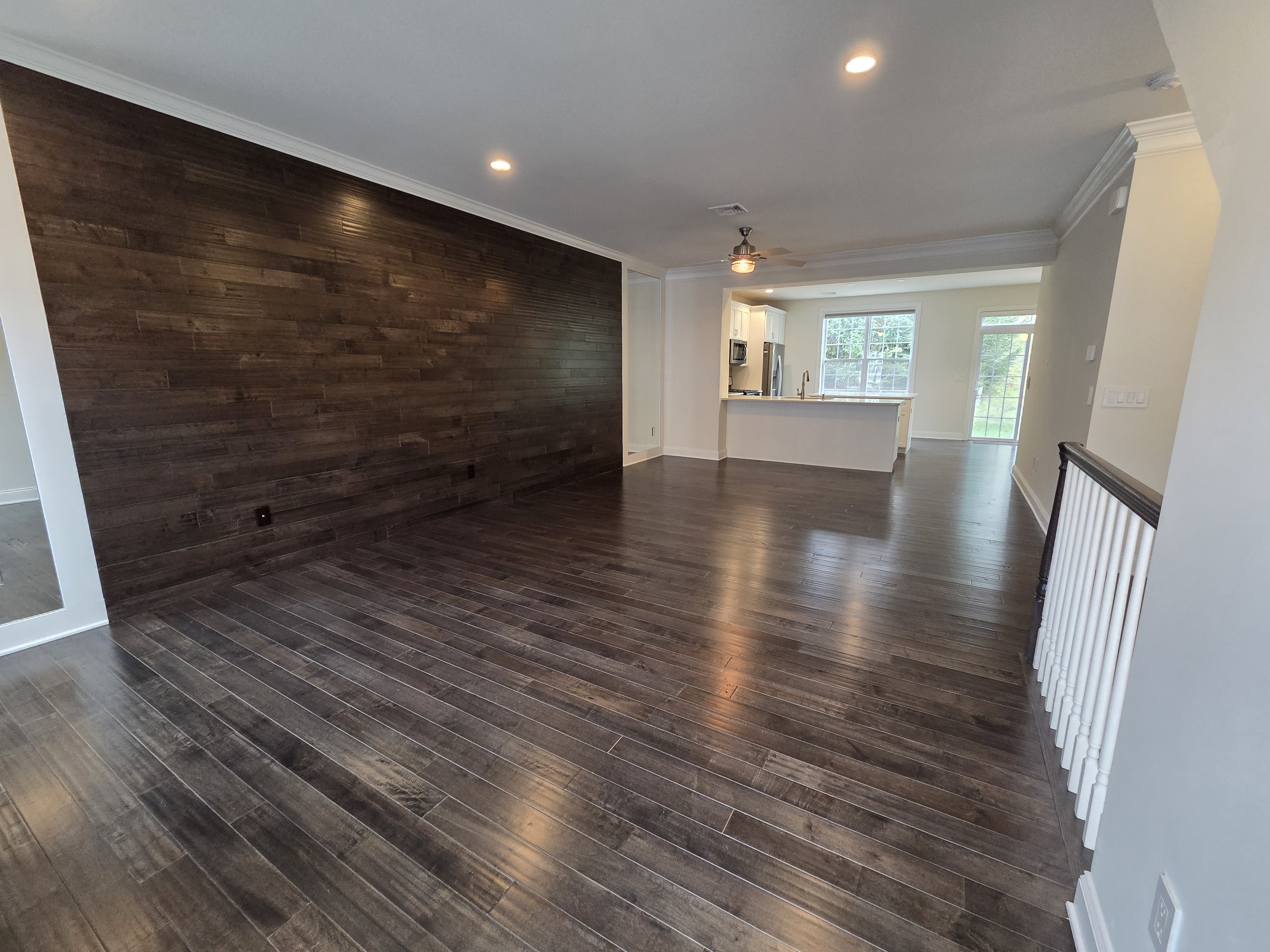 12 Putnam Lane Danbury, CT 06810 - Photo 13 of 33 a view of hallway with wooden floor and stairs