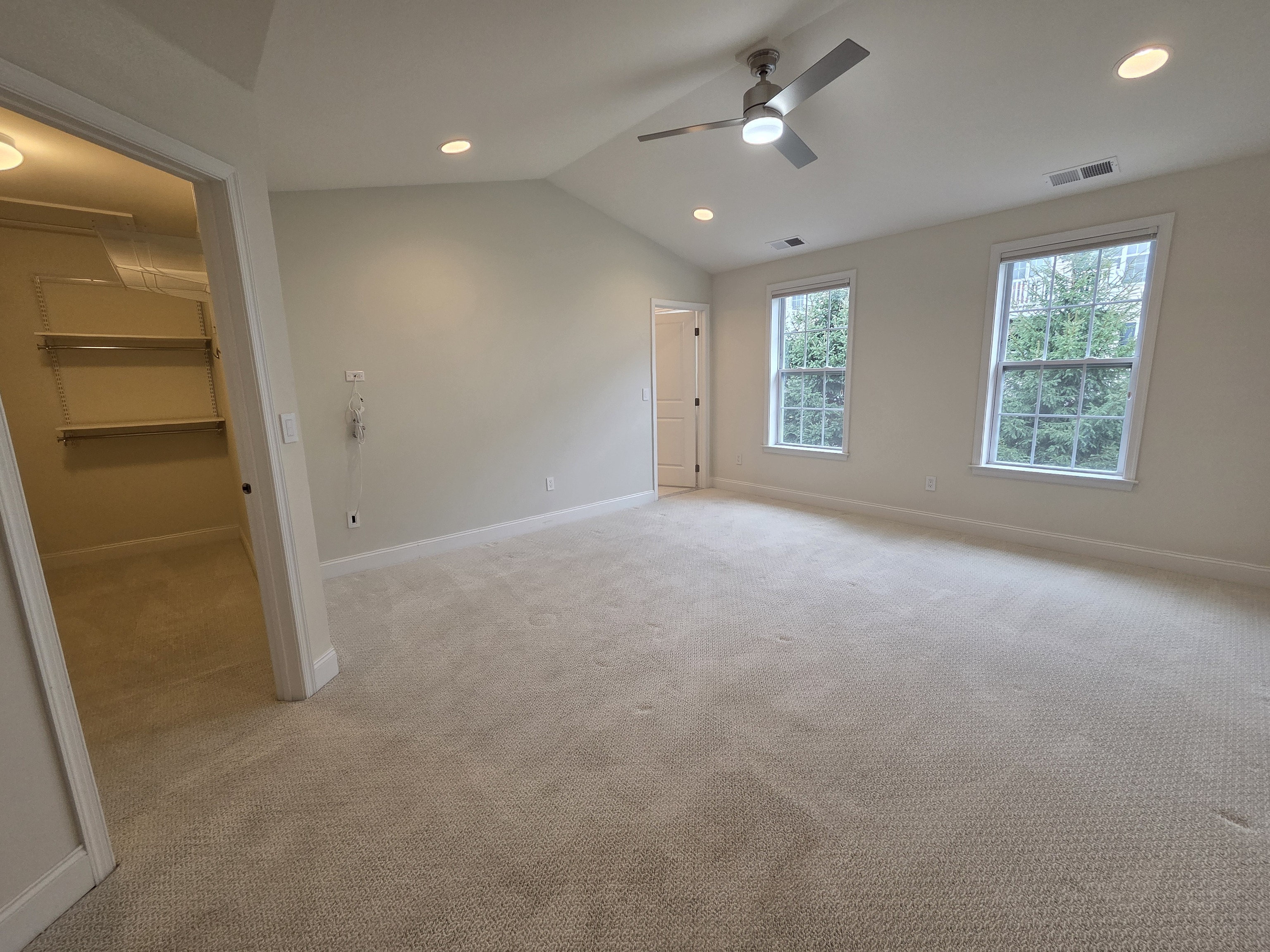 12 Putnam Lane Danbury, CT 06810 - Photo 22 of 33 an empty room with windows and fan