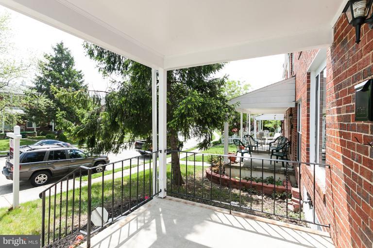 5540 Silverbell Road Baltimore, MD 21206 - Photo 24 of 30 a view of a house with backyard and porch
