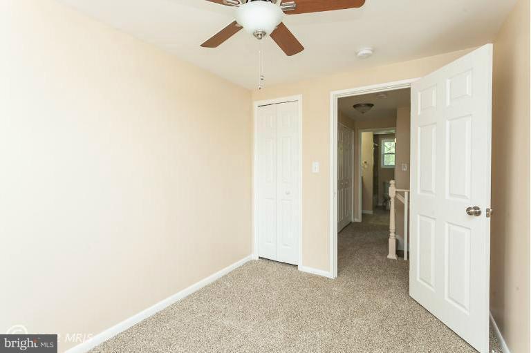 5540 Silverbell Road Baltimore, MD 21206 - Photo 28 of 30 a view of a chandelier fan and entryway