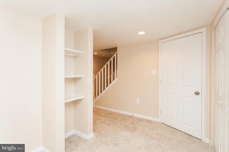 5540 Silverbell Road Baltimore, MD 21206 - Photo 8 of 30 a view of hallway with stairs