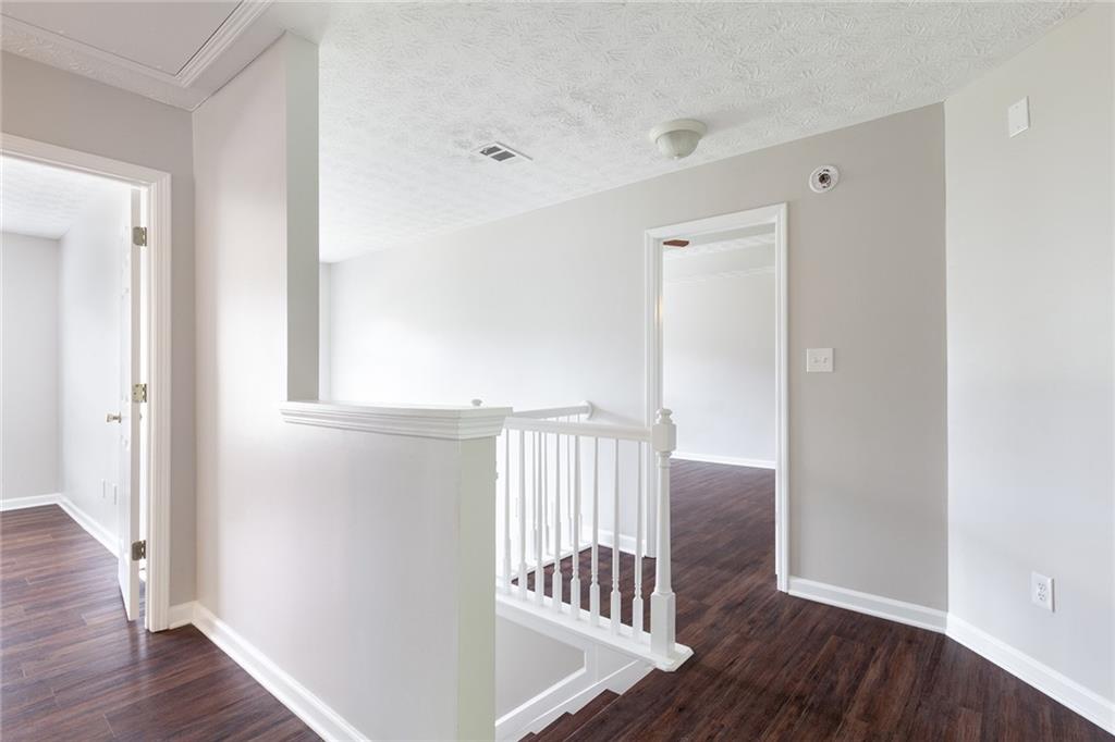 49 Parkside Drive Dallas, GA 30157 - Photo 17 of 31 a view of entryway with wooden floor