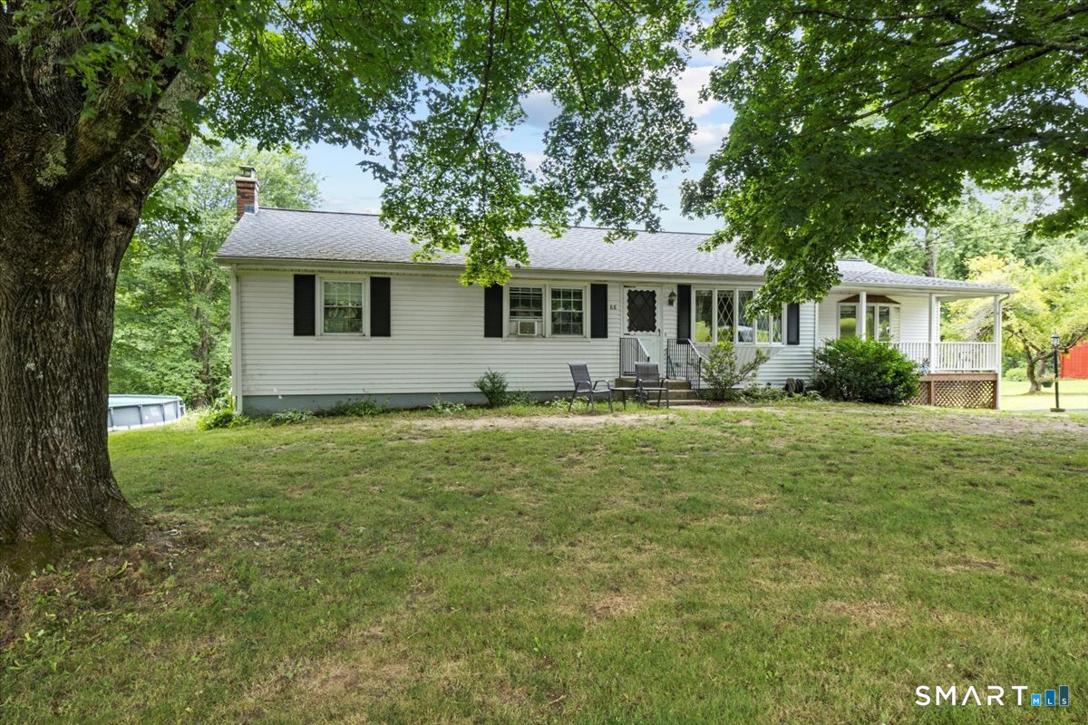 88 Pompeo Road Thompson, CT 06255 - Photo 2 of 40 a front view of house with yard and green space