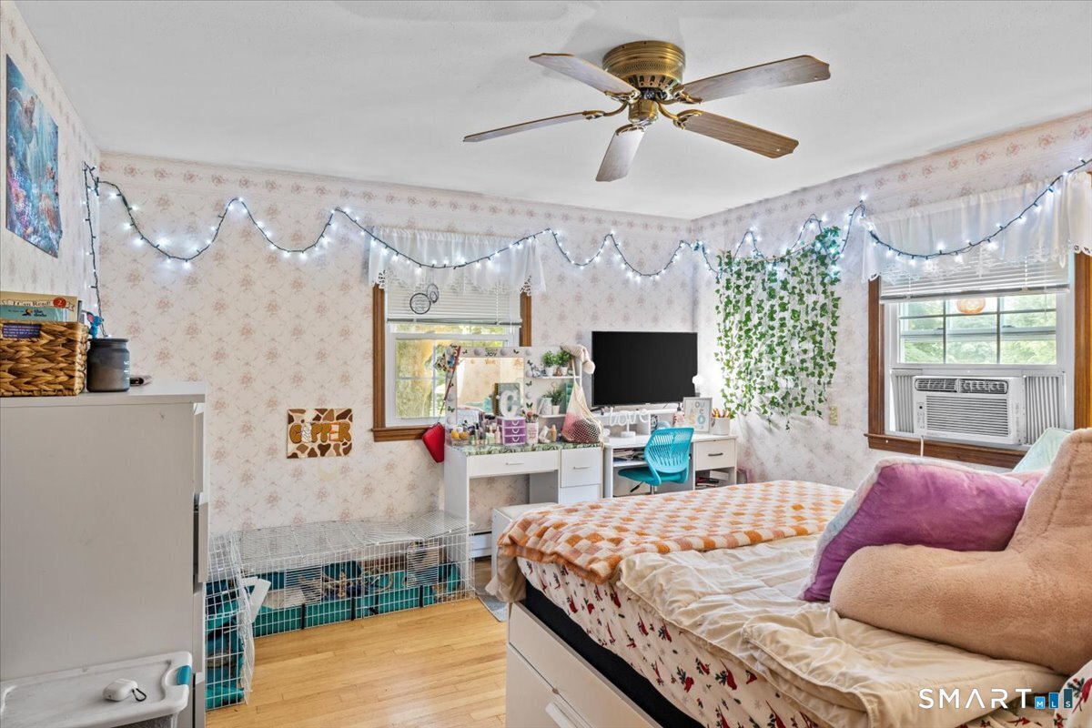 88 Pompeo Road Thompson, CT 06255 - Photo 24 of 40 a living room with furniture and a flat screen tv