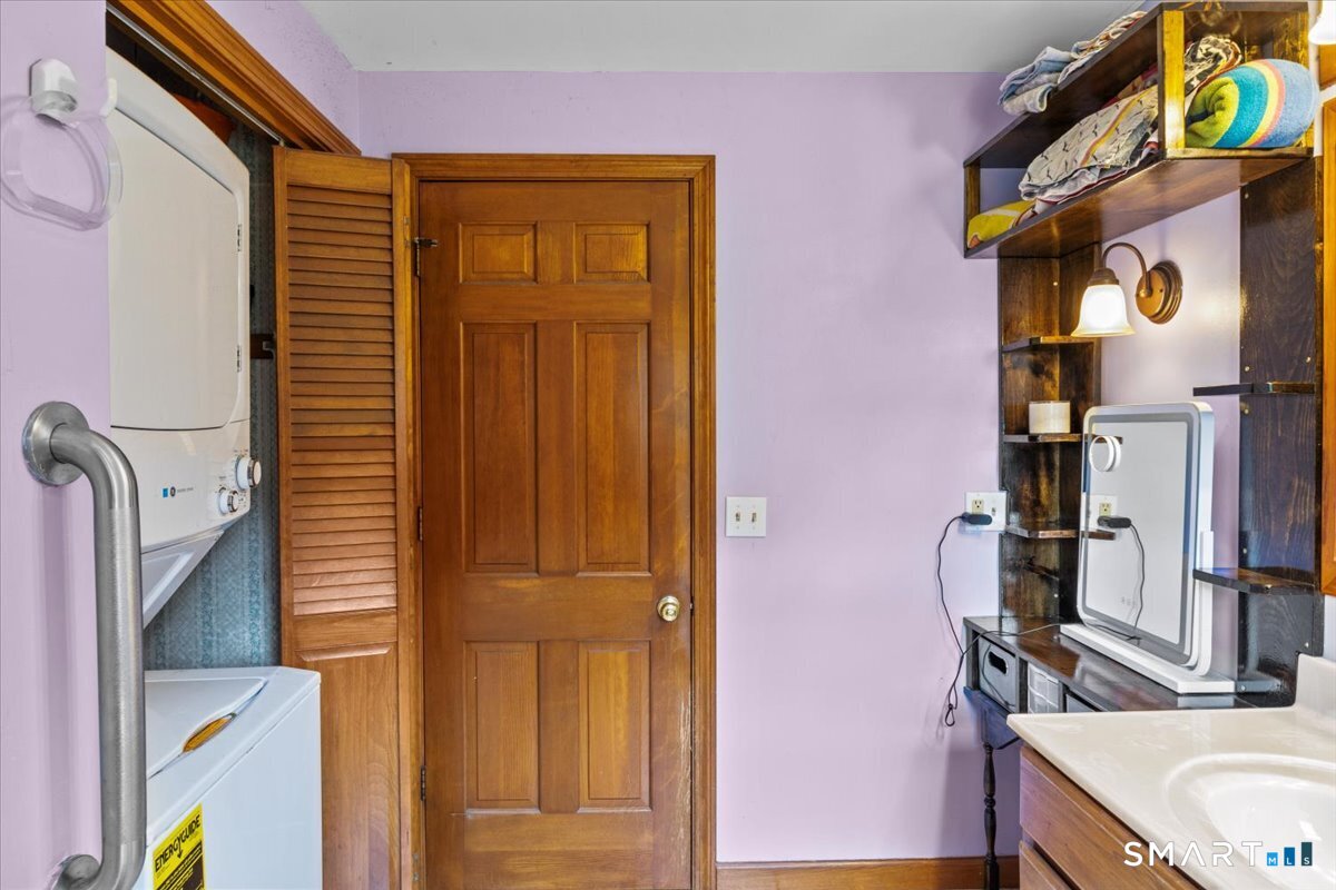 88 Pompeo Road Thompson, CT 06255 - Photo 30 of 40 a bathroom with a sink and a mirror
