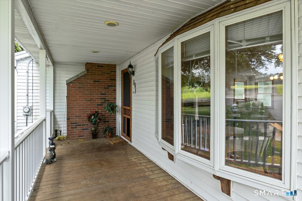 88 Pompeo Road Thompson, CT 06255 - Photo 3 of 40 a view of a porch with a door