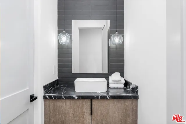 a view of a backyard with sitting area