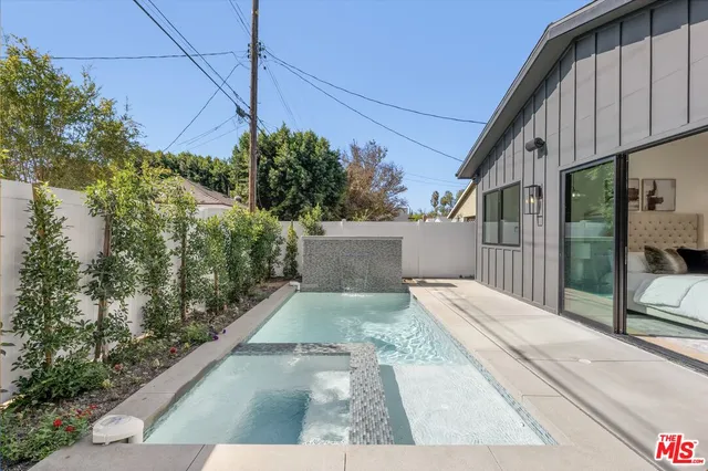 a view of a house with a street