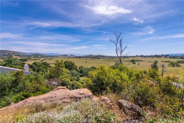 a view of a lake with a building in the background