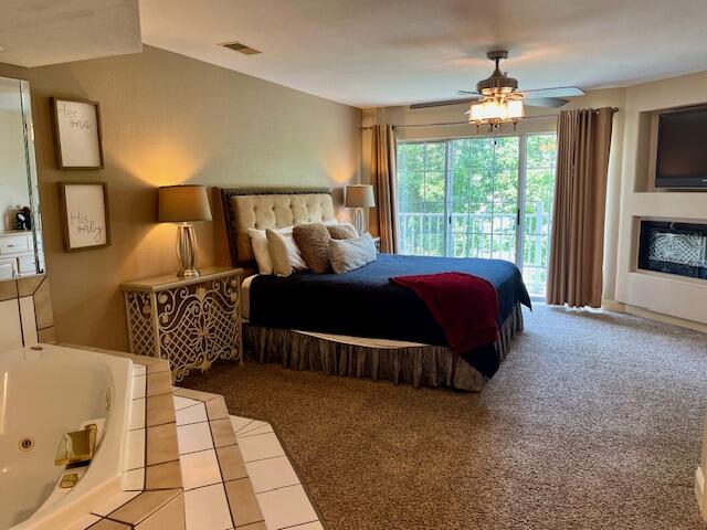 530 Spring Creek Road, Unit 57 Branson, MO 65616 - Photo 9 of 19 king bed