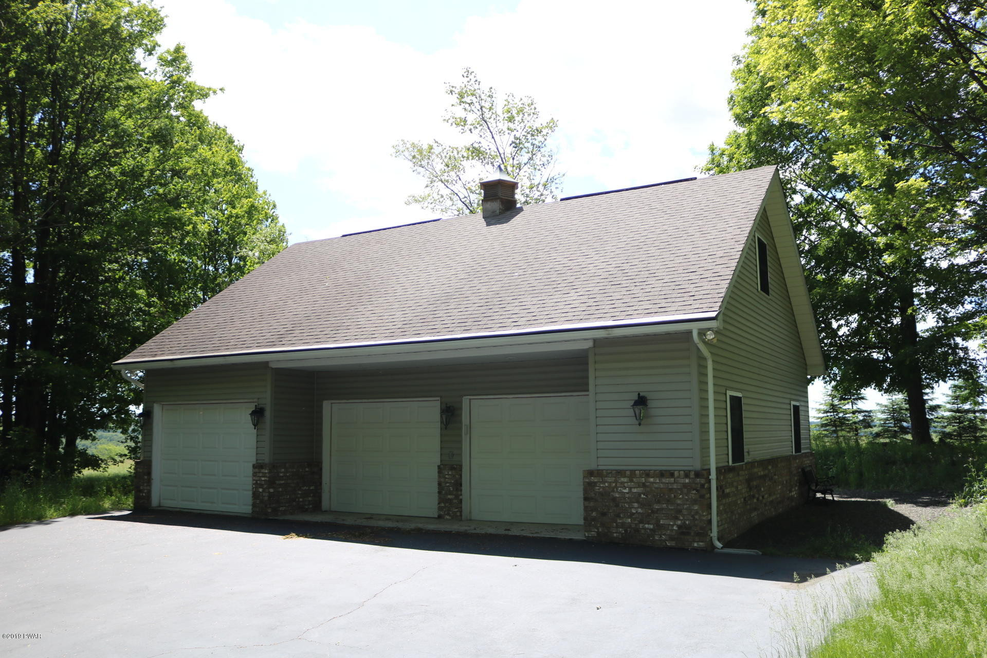 53 Savitz Road Lake Ariel, PA 18436 - Photo 2 of 53 a front view of a house with a yard