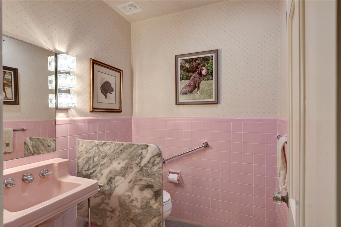 3765 Flamingo Drive Vero Beach, FL 32963 - Photo 15 of 28 a bathroom with a sink and a mirror