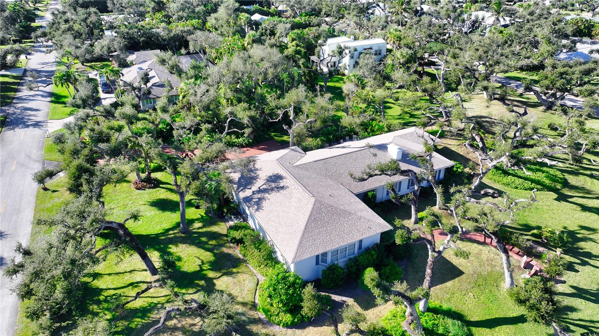 3765 Flamingo Drive Vero Beach, FL 32963 - Photo 28 of 28 a view of a bunch of flowers in a garden