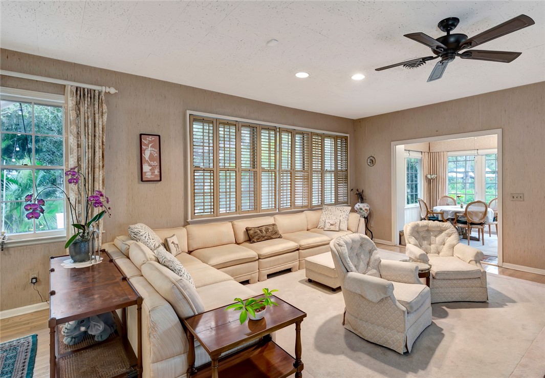 3765 Flamingo Drive Vero Beach, FL 32963 - Photo 6 of 28 a living room with furniture and a large window
