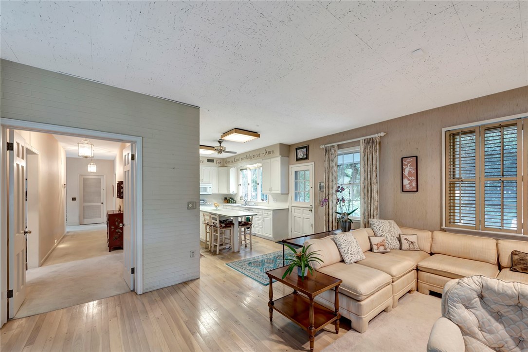 3765 Flamingo Drive Vero Beach, FL 32963 - Photo 9 of 28 a living room with furniture and large windows