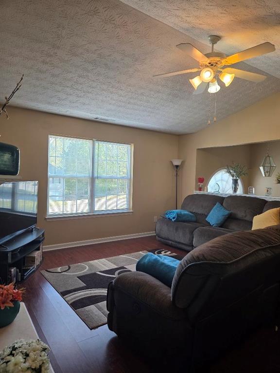 35 Pembroke Place Covington, GA 30016 - Photo 6 of 32 a living room with furniture and a large window