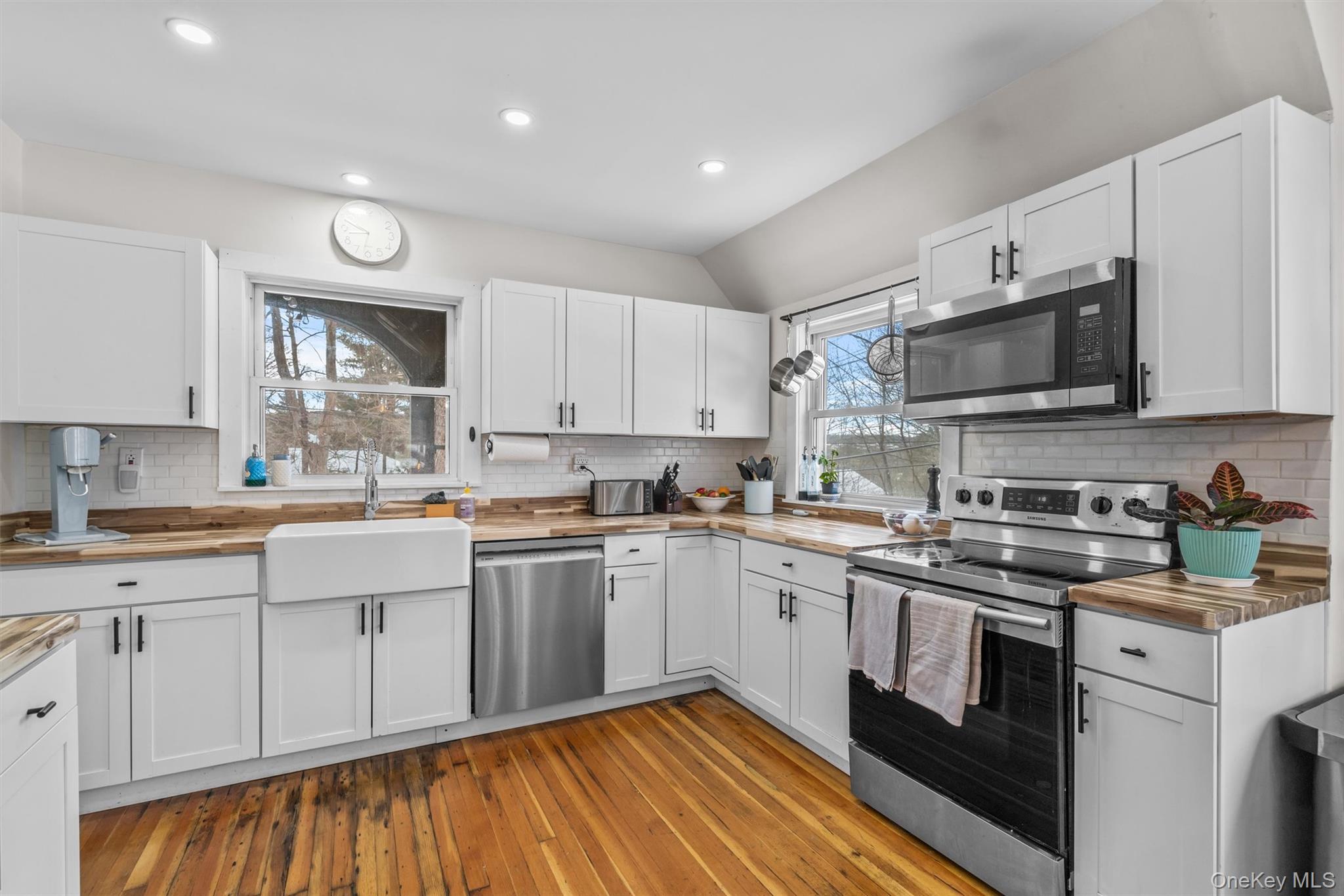 38 Post Hill Road Mountain Dale, NY 12763 - Photo 11 of 27 Kitchen with white cabinetry, appliances with stainless steel finishes, and sink