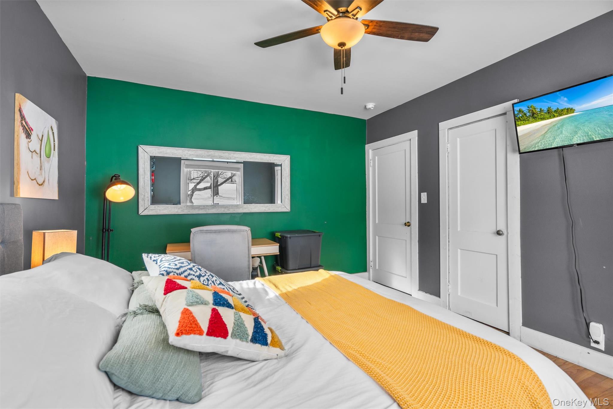 38 Post Hill Road Mountain Dale, NY 12763 - Photo 22 of 27 Bedroom with hardwood / wood-style flooring, ceiling fan, and two closets