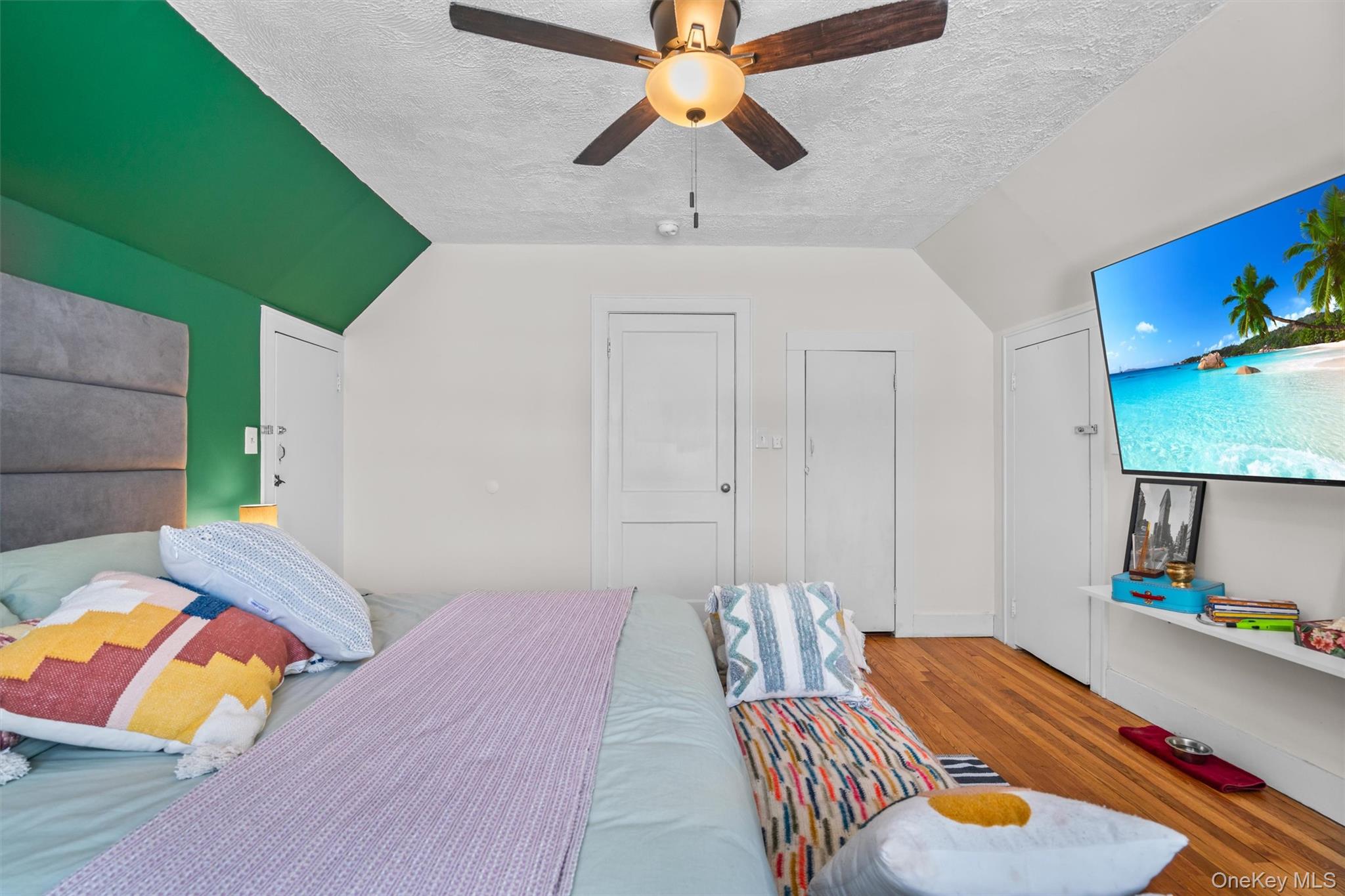 38 Post Hill Road Mountain Dale, NY 12763 - Photo 26 of 27 Bedroom with vaulted ceiling, wood-type flooring, a textured ceiling, and ceiling fan
