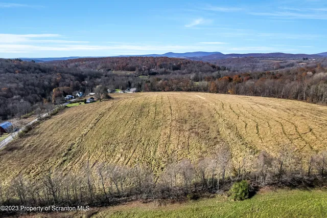 a view of a lake with mountains in the background