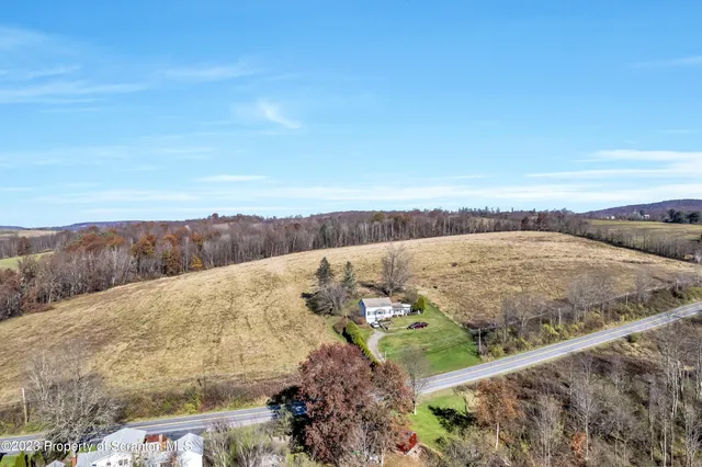 a view of an outdoor space and mountains