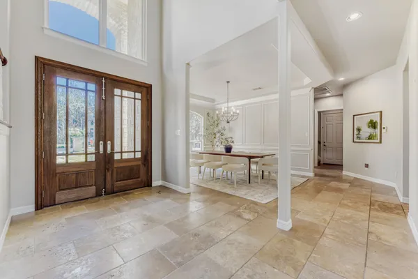 a view of a entryway with furniture and livingroom view