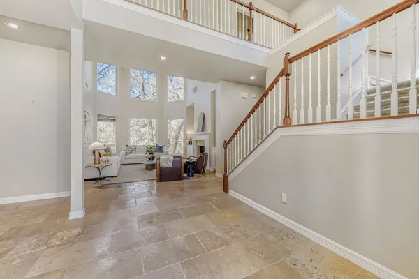 a view of a livingroom with furniture and windows