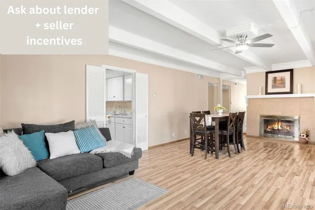 a view of a livingroom with furniture and a fireplace