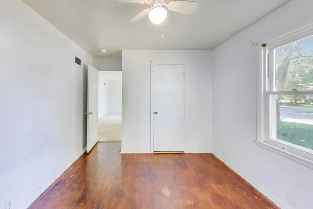 an empty room with windows