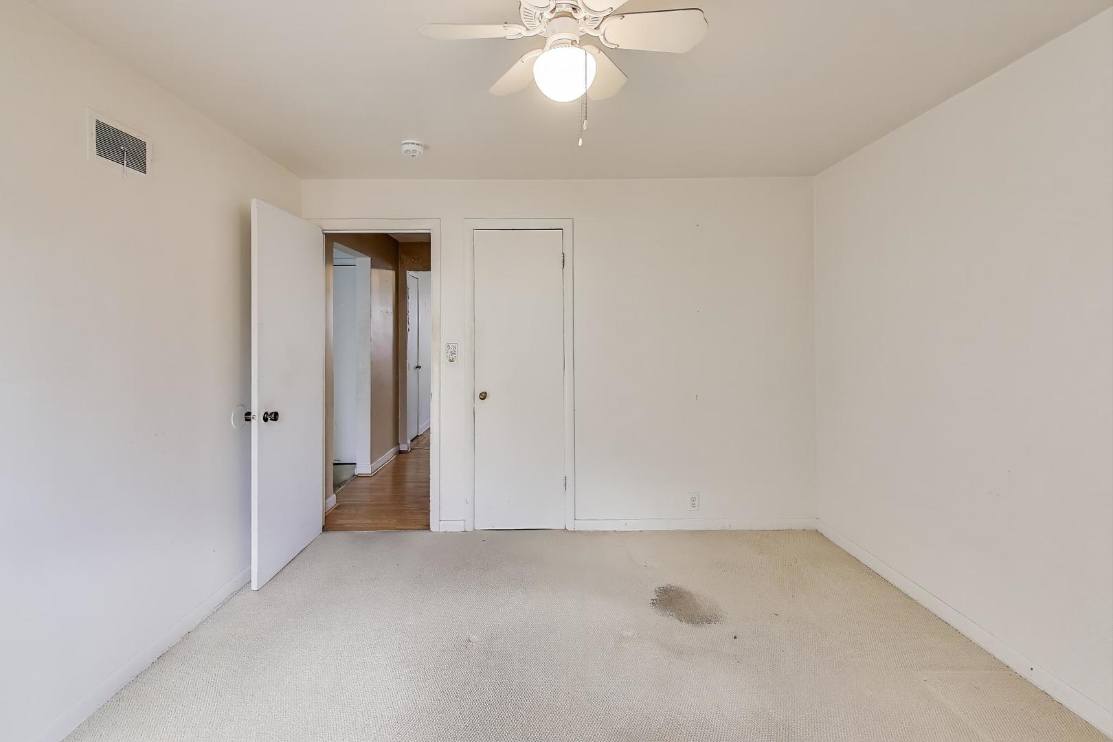 221 Heine Avenue Elgin, IL 60123 - Photo 19 of 43 wooden floor in an empty room