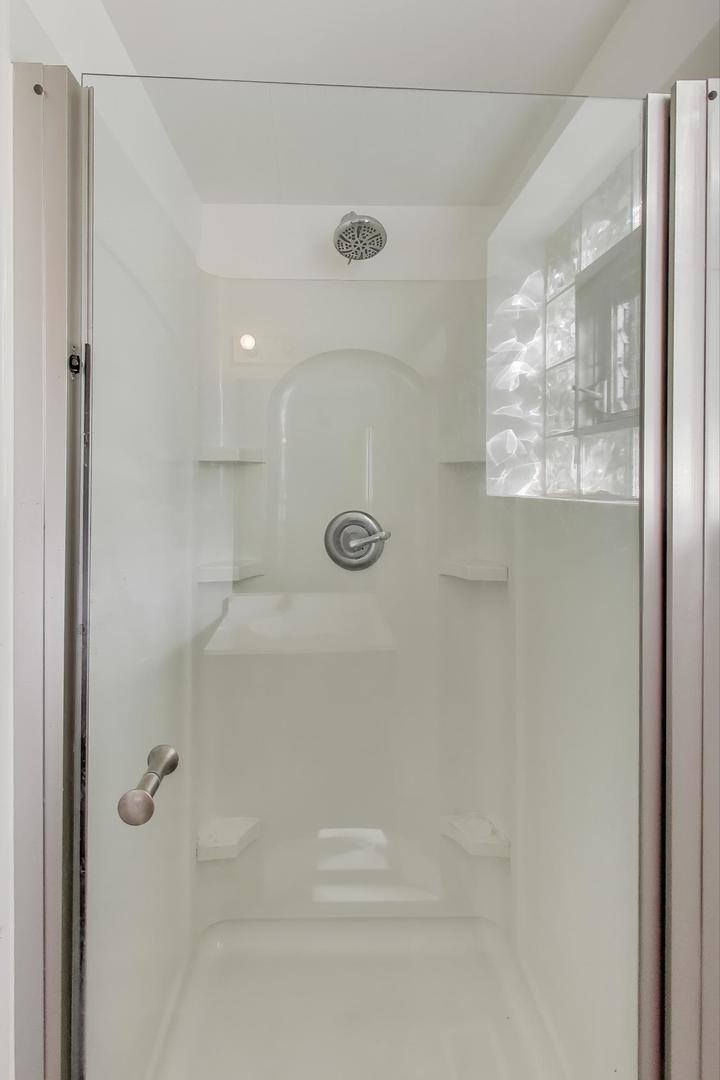 221 Heine Avenue Elgin, IL 60123 - Photo 21 of 43 a bathroom with a shower